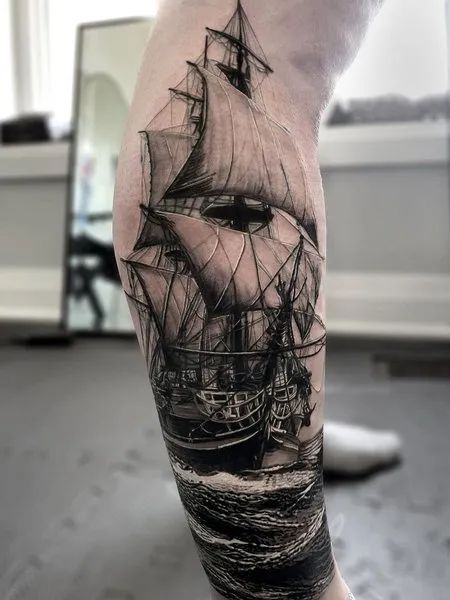 Ship Leg Tattoo Ship Leg Tattoo, Pirate Tattoo Leg, Ship Tattoo Sleeves, Leg Tattoos For Men, Pirate Ship Tattoos, Calf Tattoo Men, Nautical Tattoo Sleeve, Pirate Ship Tattoo, Thigh Tattoo Men