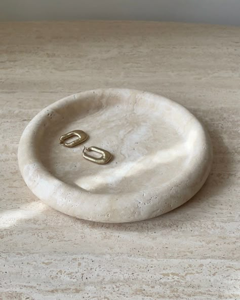 "A round travertine catchall that will be a timeless piece for your home. Place on a vanity for your jewelry, or on your entrance table for keys and other small items. Inspired by travertine flooring used in ancient Rome, this tray is sure to last.  To see how we style them, follow us @viridi.co on IG and Tiktok  Length: 7.75\" Width: 1\"~ Material: Honed Travertine" Travertine Flooring, Cowgirl Bedroom, Key Tray, Travertine Floors, Catchall Tray, Entrance Table, Travertine Marble, Rome Antique, Marble Tray