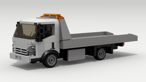 https://flic.kr/p/T2rpXS | Isuzu N-Series Tow Truck | I've wanted to make a good flat bed tow truck for a while now. This truck can fit the majority of my 6 wide city-scale cars on the back.  LXF Download Link Here Lego Tow Truck, Lego Cars Instructions, Lego Bus, Lego Tractor, Lego Christmas Village, Lego Fire, Lego Vehicles, Lego Building Instructions, Lego Truck