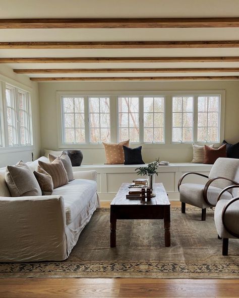 Anissa Zajac on Instagram: “Looking forward to seeing leaves on the trees soon and enjoying this room more. We added the 2x6 pine beams ( @minwaxusa early American is…” 2x6 Beams Ceiling, Pine Beams Ceiling, Wood Beam Ceiling Living Room, Ceiling Beams Living Room, Cottage Lounge, Beams Living Room, Modern Family Rooms, Airbnb House, Wood Beam Ceiling