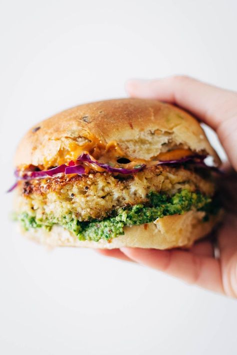 Recipe for Spicy Cauliflower Burgers with avocado sauce, cilantro lime slaw, and chipotle mayo! Meatless and delicious. 190 calories. | pinchofyum.com Burgers With Avocado, Cauliflower Burger, Lime Slaw, Cilantro Lime Slaw, Spicy Cauliflower, Chipotle Mayo, Avocado Sauce, Vegan Burgers, Think Food