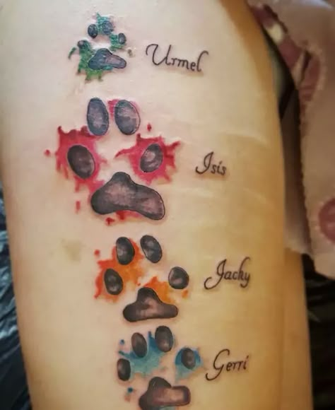 The 80+ Cutest Paw Print Tattoos Ever - The Paws Dog Paw Tattoo Color, Rainbow Paw Print Tattoo, Pet Paw Print Tattoo, Dog Paw Print Tattoo Ideas, Pawprint Tattoos, Cat Print Tattoo, Cartilage Tattoo, Charlie Tattoo, Paw Print Tattoos