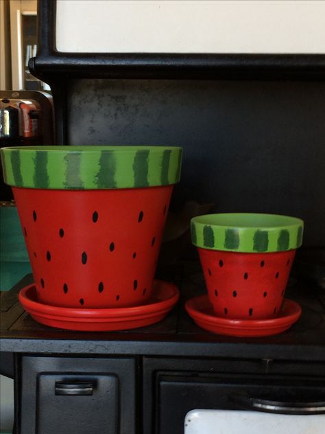 They look so sweet My style!! Strawberry Pot Painting, Strawberry Flower Pot, Watermelon Pot, Hand Painted Pottery Strawberries, Pink Painted Terra Cotta Pots, Strawberry Plant Pot Painted, Terra Cotta Pot Crafts Diy, Plant Pot Design, Clay Pot Projects