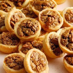 Pecan Tassies Recipe: How to Make It Pumpkin Tartlets, Pecan Tarts Mini, Tassies Recipe, Pecan Tarts Recipe, Blueberry Sweet Rolls, Finger Food Desserts, Sweet Roll Recipe, Pecan Tarts, Tarts Recipe