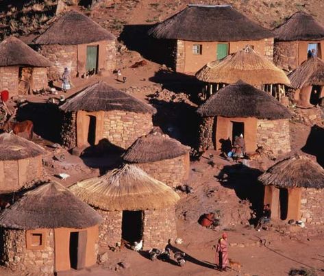 Circular huts are the traditional houses of the Sotho people of Lesotho.  (Nicholas DeVore—Stone/Getty Images) African Houses, African Hut, Primitive Houses, African Architecture, African House, Life Styles, Traditional Culture, Traditional Houses, Vernacular Architecture