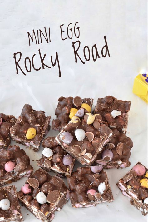 Squares of Rocky road stacked on baking paper. Easter Bars, Easter Themed Treats, Easter Baking Recipes, Rocky Road Recipe, Easter Marshmallow, Easy Easter Treats, Seasonal Baking, Fudge Flavors, Mini Egg