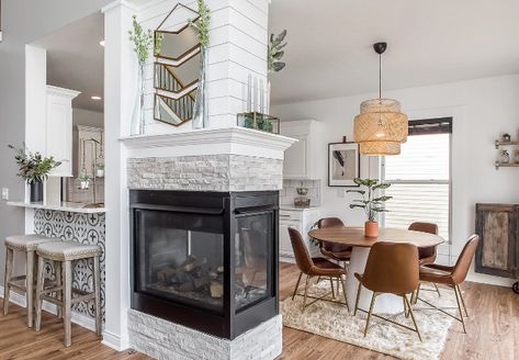 Fireplace Renovation Ideas A 3-sided fireplace brings warmth to the breakfast room and family room #FireplaceRenovation 3 Sided Fireplace, Fireplace Area, Lake Time, Memorial Weekend, Fireplace Remodel, Home Fireplace, Friends Happy, Fireplace Makeover, The Fireplace