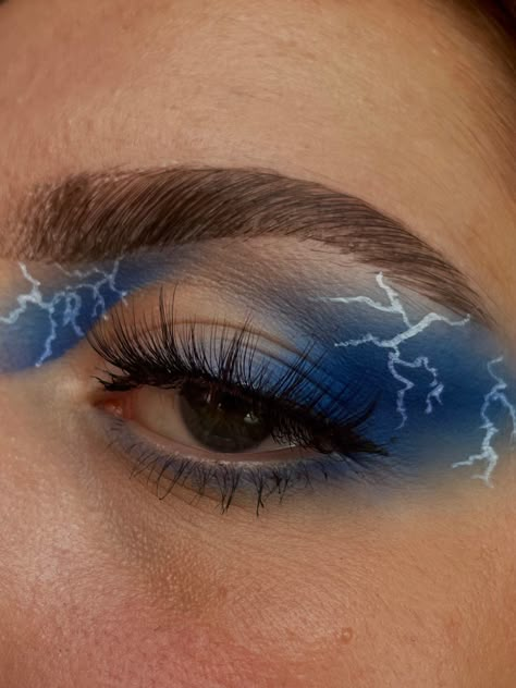 Thor Makeup Looks, Marvel Eye Makeup, Thunderstorm Makeup Look, Storm Makeup Look, Lightening Makeup Looks, Rave Eyeshadow Looks, Lighting Bolt Makeup Look, Thunderstorm Makeup, Blue Lightning Eye Makeup