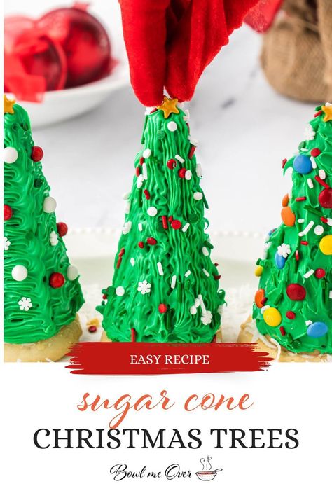 Transform your holiday dessert table into a winter wonderland with these delightful Ice Cream Cone Christmas Trees! A perfect edible craft for kids, these festive treats bring joy to the season and are as delicious as they are charming. Get ready for a deliciously creative holiday celebration! Christmas Trees Out Of Ice Cream Cones, Sugar Cone Christmas Tree, Ice Cream Cone Christmas Trees, Ice Cream Cone Christmas Tree Decorating, Ice Cream Cone Trees, Ice Cream Cone Trees Christmas Diy, Ice Cream Cone Christmas Trees For Kids, Ice Cream Cone Christmas Tree, Chunky Yarn Cone Trees