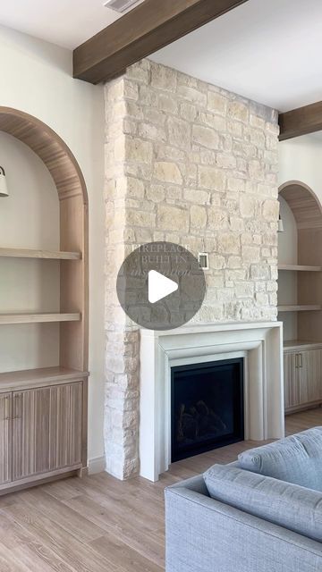 Brooke Talsma on Instagram: "So many beautiful elements of the fireplace and built-ins at Quincy. The arched built-ins, the stone and stone cast, the reeded front doors… 🤌🏼🤌🏼😮‍💨😮‍💨 What’s your favorite element?" Fireplace Surround Built Ins, Arch Built Ins Around Fireplace, Built Ins Around Stone Fireplace, Vaulted Stone Fireplace, Fireplace Arched Built Ins, Living Room Built Ins With Arches, Arched Built Ins Living Room Fireplace, Rock Fireplace With Built Ins, Rounded Built Ins