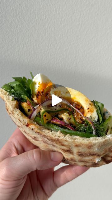 katie on Instagram: "will not be accepting any excuses at this time to not try this çilbir-ish pita for breakfast or lunch 🌶️ the @cava tzatziki makes it too easy and goooood not to #CavaPartner

and (!!) it’s currently on sale, along with the rest of their dips + dressings at Whole Foods until 4/30 while supplies lasts 😮‍💨 get on over there and report back with your pita 

#pitasandwich #quicklunchideas #cava" Pita Breakfast Ideas, Breakfast Ideas With Pita Bread, What To Eat Pita Bread With, Pita Bread Recipe Ideas Dinners, Pita Bread Recipe Ideas, Cava Tzatziki, Pita Bread Breakfast, Pita Bread Fillings, Pita Sandwich Recipes