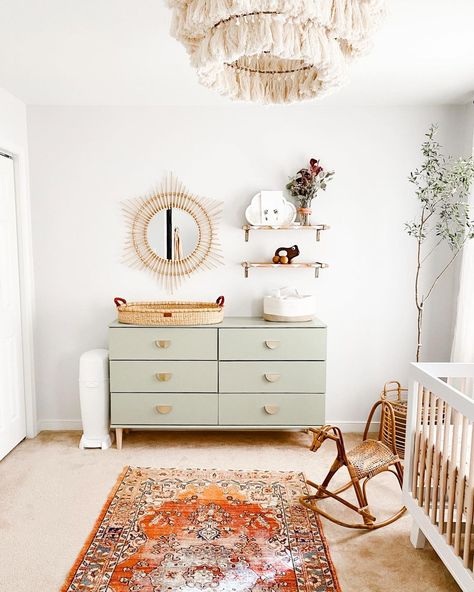 Sage And Ivory Nursery, Boho Nursery Dresser, Nursery With Carpet, Boho Vintage Floral Nursery, Nursery Ideas Retro, Eclectic Nursery Girl, Nursery In Master Room, Earthy Baby Nursery, Boho Farmhouse Nursery With Differrent Color Furniture