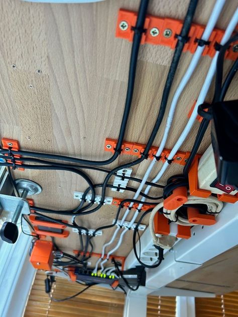 Under Desk Cable Management by dsw73 - Thingiverse 3d Print Cable Management, 3d Printing Workspace, Cable Management Diy, Under Desk Cable Management, Under Desk Cable, Desk Cable Management, Useful 3d Prints, 3d Printing Diy, 3d Printer Projects