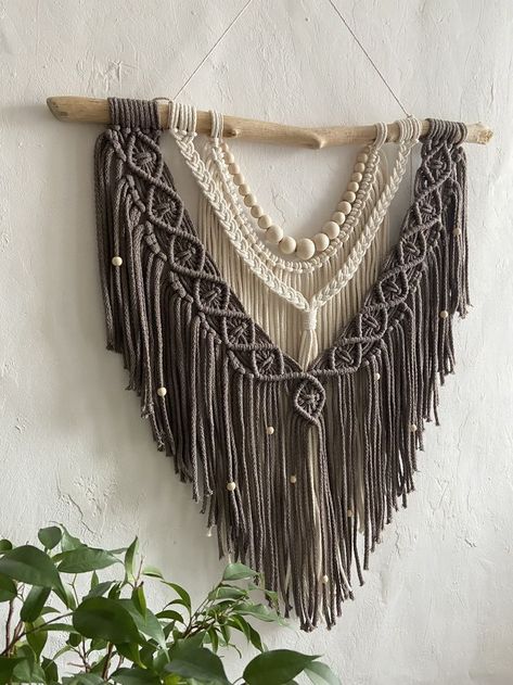 Brown Macrame pattern wall hanging with the wooden beads by MacrameKnotsbyNika. Diy macrame pattern, macrame pattern pdf, tutorial pdf, macrame wall hanging. This is a macrame digital PATTERN for beginners (instant download) of Macrame wall hanging in the pictures. It contains a step-by-step written tutorial on how to complete this project. The description is very detailed (14 pictures) + the knot guide, it will be easy to follow Wooden Beads Diy, Knot Guide, Beads Macrame, Brown Macrame, Macrame Wall Hanging Patterns, Diy Macrame, Hanging Macrame, Pattern Wall, Macrame Decor