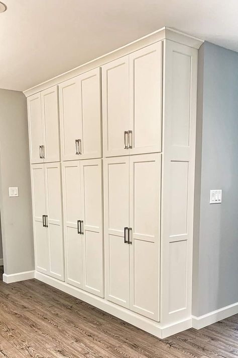 Basement Built In Storage Cabinets, Mudroom With High Ceilings, Built In Storage Laundry Room, Large Laundry Room Cabinets, Whole Wall Storage, Mudroom Pantry Storage, Full Wall Of Cabinets, Laundry Room Wall Of Cabinets, Built In Cabinets For Storage