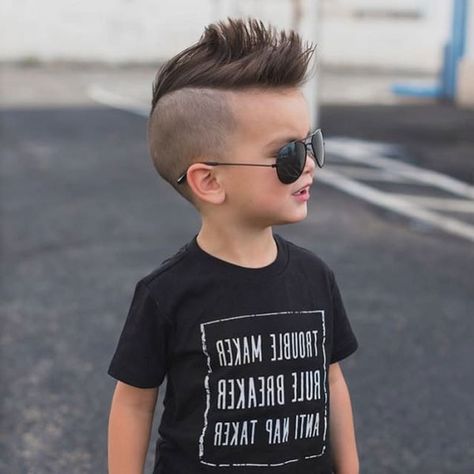 Cool Little Boys Mohawk #fade #boysfade #boysshorthair #boyshair #cutekids #littleboys #boyshairstyles #boyshaircuts #kidshaircuts Toddler Mohawk, Boys Faux Hawk, Kid Haircut, Boys Mohawk, Mohawk Cut, Fohawk Haircut, Mohawk Fade, Kids Hairstyles Boys