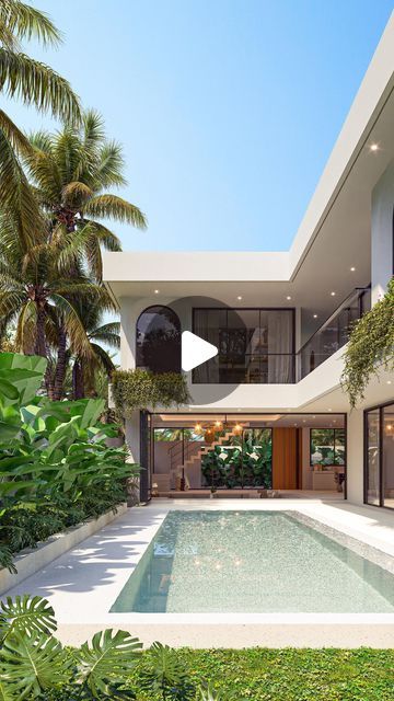 BALI ARCHITECT & CONSTRUCTION on Instagram: "Step into this stunning modern villa where sleek design meets tropical bliss. From the elegant pool to the lush greenery, every detail screams luxury. Take in those arched windows, hanging plants, and that inviting outdoor lounge. Which feature catches your eye? Imagine yourself here - this could be your dream house! Ready to make this dream a reality?   📍Location: Client’s Project - Bingin, Uluwatu Designed by @balitecture  If you are interested in building your own dream villa in Bali, get in touch with @balitecture for all your architecture and construction needs." Bali Villa Design Tropical Homes, Bali Villa Pool, Bali House Design Villas, Modern Bali Villa, Elegant Pool, Bali Architecture, Villa In Bali, Dream Villa, Island Homes