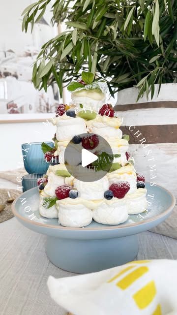 Dina santos on Instagram: "CHRISTMAS TREE PAVLOVA DESERT  Not much of a baker and need a no cooking and easy desert  for your Christmas or New Year’s Day celebration ?  This cute mini pavlova desert tree then is for you lol , its easy to make and pretty much took me under 1/2 hr to whipped the cream and assemble it. l used raspberries, blueberries , kiwi fruit  and drizzled it with fresh passion fruit pulp and decorated with fresh mint  leaves.  Hope you all are having a wonderful Friday 💕.  Ingredients: 3 boxes of the petit pavlovas 2 thickened cream 600 ml bottles (whipped) with 2 tablespoons icing sugar  Fruit of choice and passionfruit syrup Mint leaves to decor Instructions on the reel, very simple as you can see on video .  . . . . #christmasrecipes #christmasready #kmartdecor #chri Pavlova Christmas Tree, Pavlova Tree, Passionfruit Syrup, Meatballs With Sauce, Xmas Breakfast, Salmon Meatballs, Christmas Pavlova, Thickened Cream, Easy Christmas Cake Recipe