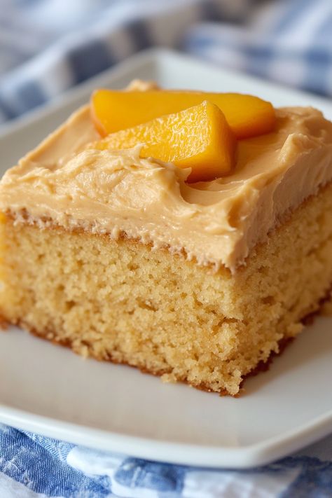 This Peach Cake with Brown Sugar Frosting can be enjoyed all year with fresh, frozen, or canned peaches. It's a breeze to prepare using a boxed cake mix, jello powder, and sliced peaches. Topped with a luscious brown sugar frosting that tastes like whipped caramel, each bite is a luxurious delight. Sometimes, you crave a Pea Picking Cake, Brown Sugar Peach Cake, Peach Jello, German Chocolate Brownies, Brown Sugar Frosting, Au Gratin Potato Recipes, Peach Dessert, Au Gratin Recipes, Peach Dessert Recipes