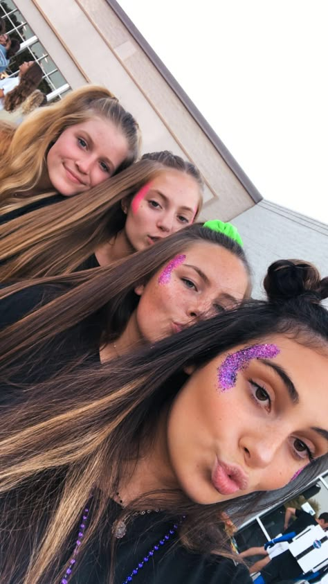 Neon Football Game Theme Face Paint, Neon Face Paint Ideas For Football Games, Homecoming Face Paint, Homecoming Face Paint Ideas, Spirit Face Paint Ideas, Spirit Face Paint, Cheer Themes, Game Day Face Paint, Diy Teen Halloween Costumes