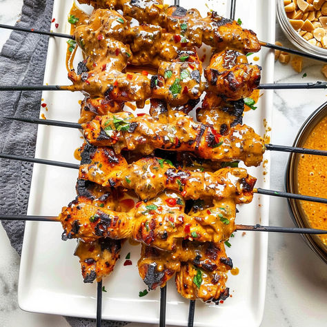 Fire up the grill with these Thai Curry Chicken Skewers! Juicy, flavorful chicken paired with a creamy coconut peanut sauce makes the perfect dish for any BBQ or dinner. Ready in no time and packed with exotic Thai flavors! Asian Skewers, Curry Chicken Skewers, Thai Curry Chicken, Thai Bbq, Thai Flavors, Perfect Grilled Chicken, Thai Menu, Thai Spices, Honey Lime Chicken