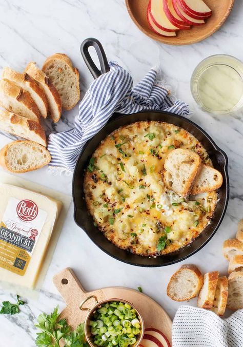 This Baked Cheesy Cauliflower Party Dip is the perfect healthy vegetarian appetizer! Great for the holidays, its base is blended cauliflower and Greek yogurt topped with a layer of cheese. | Love and Lemons #appetizers #holidayrecipes #partyfood #cauliflower Healthy Holiday Appetizers, Cauliflower Dip, Greek Yogurt Toppings, Party Dip Recipes, Party Dip, Cauliflower Dishes, Healthy Greek Yogurt, Cheesy Cauliflower, Party Dips