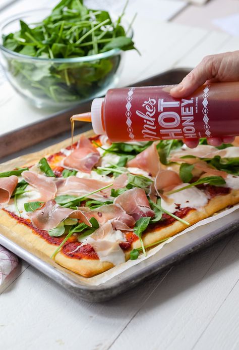 15 Ways to Make a Frozen Pizza Taste Better That Won't Break The Bank | Kitchn Bbq Pizza Recipes, Prosciutto Pizza Recipes, Honey Ginger Salmon, Hot Honey Recipe, Honey Pizza, Roasted Winter Vegetables, Root Vegetable Soup, Lemon Roasted Chicken, Prosciutto Pizza