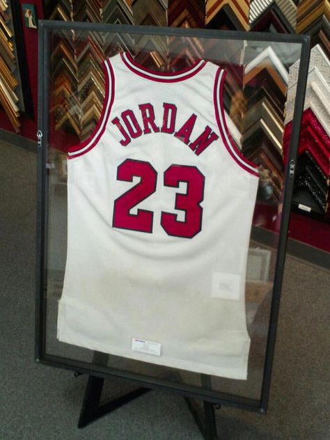 Michael Jordan wore this signed jersey in the 1996 Game 6 Championship. Peter designed a floating frame between two pieces of art glass for this piece. Signed Jersey Display, Framed Jersey Ideas, Frame Jersey Ideas, Jersey Ideas, Jersey Display, Jordan Jersey, Framed Jersey, Glass Case, Michael Jordan