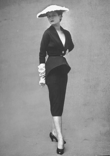 Paris Spring Fashions  Model posing in black cocktail dress featuring a deep V neck which almost goes to the waist by designer Jacques Griffe.  Location:	Paris, France  Date taken:	February 1951  Photographer:	Gordon Parks White Alpaca, Vintage Haute Couture, Jean Shrimpton, Jacques Fath, Trendy Photography, 50's Fashion, 1950 Fashion, Vintage Suit, Fifties Fashion