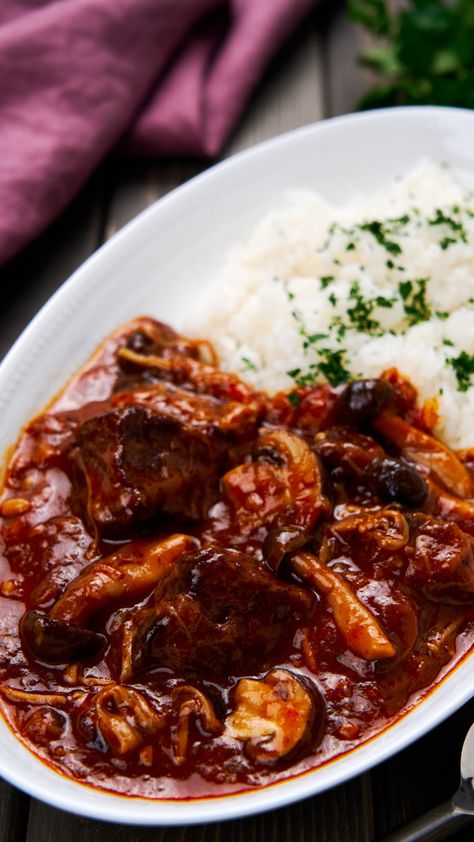 With beef stewed together with mushrooms, onions, red wine, and tomatoes until it's spoon tender, Hayashi Rice is a popular Japanese comfort food during the colder months. Japanese Stew, Japanese Beef Stew, Hayashi Rice, Beef With Onions, Asian Potluck, Beef Braised, Asian Noodle Dishes, Asian Side Dishes, Japanese Diet