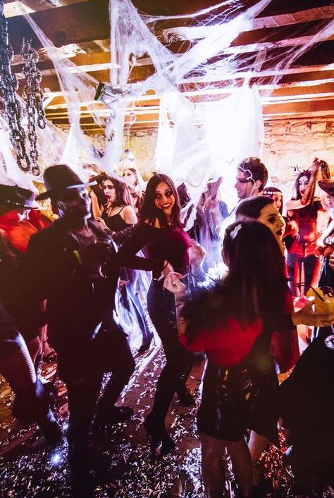 Multi-ethnic people in Halloween costumes having fun at dungeon nightclub House Party Ideas, Horror Movie Night, Halloween Club, Halloween Songs, Black Halloween Dress, Apocalypse Survival, Adult Party Games, Halloween Party Games, Halloween Party Themes