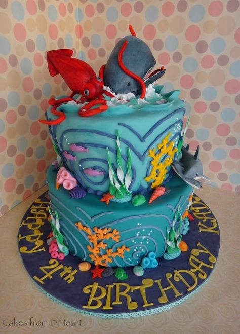 Made this under the sea theme cake for a little boy whose favorite sea marine animals are the whale and giant squid. Had a lot of fun making the figurines which include a hammerhead shark and a cute sea turtle, all made of gum paste and hand painted. Squid Cake, Whale Birthday Cake, Dolphin Birthday Cakes, Dolphin Cake, Dolphin Birthday, Whale Cakes, Dolphin Cakes, Dolphin Party, Sea Dolphin