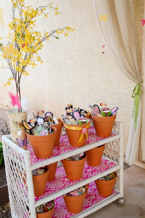 At the end of the party, each child received a terracotta pot filled with butterfly treasures: a butterfly headband, pencils, butterfly-shaped bath fizzies, butterfly-shaped chalk, and a tiny flower pot with sunflower and zinnia seeds to plant at home. Butterfly Garden Birthday Party, Butterfly Garden Birthday, Butterfly Themed Birthday Party, Garden Party Favors, Butterfly Garden Party, Zinnia Seeds, Garden Birthday Party, Butterfly Headband, Butterfly Birthday Party