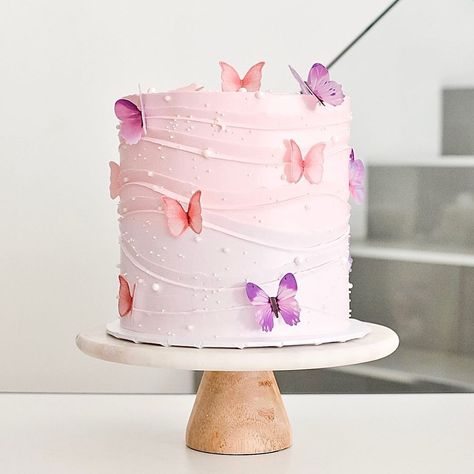 Pink and purple ombre butterfly wave cake for a baby shower 🦋 this is a favorite classic design of mine 🫶🏻 • • • • #pink #purple… | Instagram Baby Shower Cake Designs For Girl, Enchanted To Meet You Baby Shower Cake, Enchanted Baby Shower Cake, Baby Shower Cakes Girl Butterfly, Pink Purple Baby Shower Ideas, Pink And Purple Butterfly Cake, Pink And Purple Baby Shower Ideas, Baby Shower Butterfly Cake, Girl Baby Shower Cake Ideas