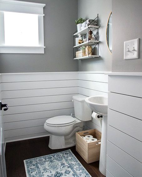 Everything You Need to Know About Shiplap | Perfect for that modern rustic look in your home. Shiplap is used as an accent in this small space. It adds visual texture to this gray and white bathroom without overwhelming the space.    #shiplap #bathroom #marthastewart #decoratingideas Beautiful Powder Rooms, Makeover Kamar Mandi, Modern Powder Rooms, Modern Powder Room, Diy Wainscoting, Kitchen Ornaments, Modern Toilet, Decor Baie, Basement Bathroom