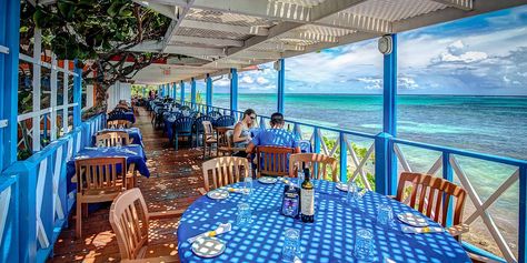 The 12 Best Waterfront Restaurants in Grand Cayman | Explore Cayman Georgetown Grand Cayman, Asian Cafe, Cayman Brac, Grand Cayman Island, Cayman Island, Waterfront Dining, Waterfront Restaurant, Grand Cayman, Budget Hotel