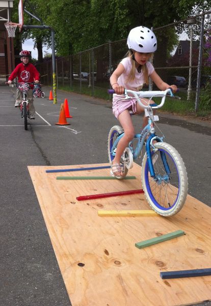 One thing we’ve found at Bryant over the years is that you attract kids by making biking very fun. No surprise there and it’s really not very hard as biking is so inherently fun anyway. Good … Wheelchair Obstacle Course, Bike Rodeo Obstacle Course, Bike Rodeo Ideas For Kids, Bike Party Ideas For Kids, Bike Obstacle Course, Kids Bike Track, Bike Rodeo, Bicycle Birthday Parties, Bike Games