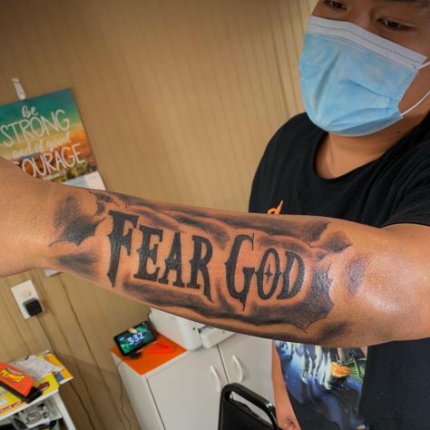 Blessed Arm Tattoo, Fear God Tattoo Men, Fear God Tattoo, Forearm Name Tattoos, Inside Bicep Tattoo, Hop Tattoo, Arm Tattoos Black, Arm Tattoos For Guys Forearm, Tricep Tattoos