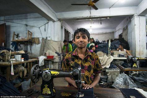 A young garment worker at his working station. His work consists of stitching labels to blue jeans. Working Station, Ethical Consumerism, Speakeasy Party, Child Labour, Garment Workers, Simple Sweaters, Garment Industry, Garment Factory, Outfit Collage