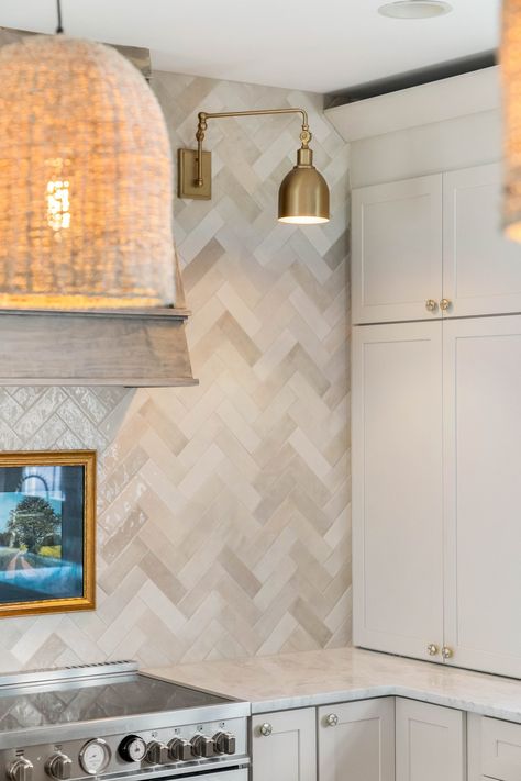 A herringbone backsplash is a gorgeous way to add a dynamic touch to your kitchen #renovationspot . . . . . #discoveratl #atlantahomebuilder #atlantahomerenovations #homerenovations #interiorrenovation #supportlocal #homeinspo #renovations #exteriorrenovation #atlantahomes Herringbone Kitchen Backsplash, Creative Kitchen Backsplash, Neutral Backsplash Kitchen, Farmhouse Mantle Decor, Herringbone Kitchen, Modern Kitchen Backsplash, Custom Built Cabinets, Stone Backsplash Kitchen, Condo Kitchen