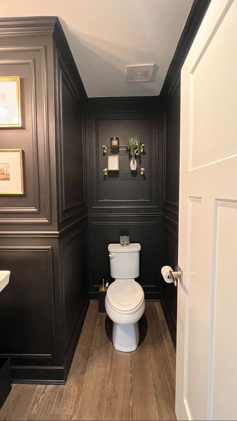 Moody Monday 🖤✨ A powder room is a great space to go bold and have a little fun with your design! What design styles are inspiring you in … | Instagram Powder Room Hardwood Floor, Dark Downstairs Toilet, Vampire Bathroom, Half Bath Wall Decor, Small Dark Bathroom Ideas, Moody Small Bathroom, Living Playroom, Classic Powder Room, Small Dark Bathroom