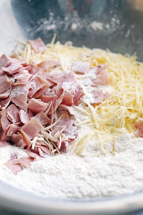 All-purpose flour, baking powder, sugar, salt, shredded cheese, and diced deli ham in a large stainless steel bowl. Deli Ham Ideas, Recipes Using Deli Ham, Deli Ham Recipes, Cheese Drop Biscuits, Easy Drop Biscuits, Blueberry Loaf Cakes, Drop Biscuits Recipe, Quick Bread Recipes Easy, Ham Breakfast