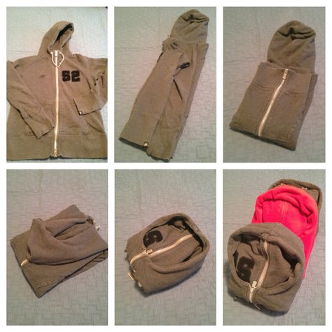 Fold hoodies and hooded shirts. The pic is really unhelpful, I didn't follow it. I zipped up my hoodie and laid it flat (zipper - and logo - side up). I brought the end of the left sleeve to the bottom right corner of the body, then did the reverse (right sleeve -> bottom left corner). Folded the side seams in towards the zipper until the width equaled that of the base of the hood, and folded the bottom edge up to meet it. Fold body up into hood, and BAM! Now it can be stacked or hung with ease! Packing Hoodies Hacks, How To Fold A Zip Up Hoodie, How To Roll Hoodies For Packing, How To Fold Hoodies For Travel, How To Fold Pijamas Drawers, Shirt Folding Trick, Folding Socks, Marie Kondo Organizing, Folded Arms