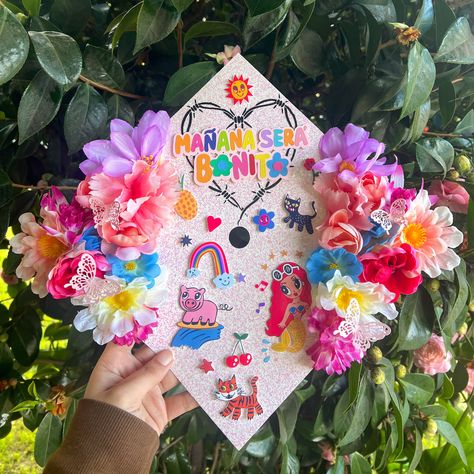 🎶Mañana será bonito ✨💖🌈🌸 DM to order today 💌 #ClassOf2024 #GradCapDecor #CustomToppers #GraduationMemories #CapTopperCreations #PersonalizedGraduation #TasselToppers #UniqueGraduation #CapDecoration #CelebrateAchievement #GraduationKeepsake #DecorateYourCap #GraduationInspiration #CapToppersForSale #CraftedWithCare #GraduationSeason #CapDecorationIdeas #CustomizeYourCap #GradCapArt #MemorableMoments #mañanaserabonito✨🌈🌸 #karolg Graduation Cap Designs Karol G, Karol G Graduation Cap, College Caps, Graduation 2025, Graduation Memories, Graduation Cap Decoration Diy, Grad Cap Designs, Diy Graduation Cap, Grad Cap Ideas