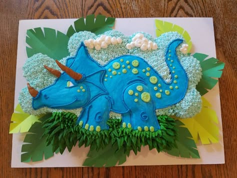 A 2D dinosaur cupcake cake. Cupcake Cakes Pull Apart Dinosaur, Pull Apart Dinosaur Cake, Dino Pull Apart Cupcakes, Dino Cupcake Cake Pull Apart, Cupcake Dinosaur Cake, Dinosaur Pull Apart Cupcakes, Dino Cupcake Cake, Cake Ideas Dinosaur, Pull Apart Cake Ideas