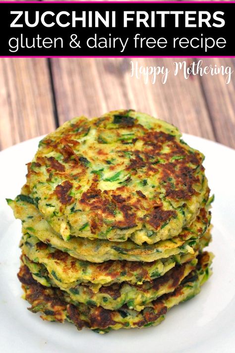 Learn how to make the best gluten free Zucchini Fritters in this easy fried appetizer recipe. Also great as a side dish, these healthy veggie fritters are made with the bounty of zucchini we get from our CSA or garden every summer. Dairy free, paleo and kid friendly too! #zucchinifritters #zucchinirecipes #fritters #fritterrecipes #glutenfree #glutenfreerecipes #sides #sidedishes #appetizers #appetizerrecipes #appetizerideas #zucchini #veggiesides #vegetarian #dairyfree #easyrecipes #howto Dairy Free Zucchini Fritters, Gluten Free Zucchini Recipes, Paleo Zucchini, Dairy Free Recipe, Veggie Fritters, Zucchini Fritters Recipe, Gluten Dairy Free, Fritters Recipe, Gluten Free Appetizers