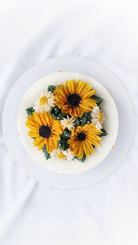 Ending this week with some sunflowers and daisies! One of my all time favorites and I do "fall in love with it a little bit more" every time I see it! 🥰😍 . . . . . . . . . #cakereels #buttercreamflowers #flowerpiping #pipingflowers #pipingskills #floralcake #flowercake #cakevideos #caketutorials #reelsindia #reelcake #cakereelsofinstagram #buttercreamflower #buttercreamflowercake #snfcakes #cakevideo #cakevideosdaily #buttercream #buttercreamflower #buttercreamart #cakeartistindia #indi Sunflower Birthday Cakes, Sunflower Birthday, Piping Flowers, Buttercream Flower Cake, Floral Cakes, Sunflowers And Daisies, Cream Art, Incredible Edibles, Buttercream Flowers