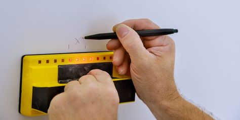 For hanging frames or your recent DIY project, a stud finder effectively helps locate solid wood studs behind drywall. Here are the best stud finders. Stud Finders, Table Saw Jigs, Stud Finder, Live Wire, Wood Studs, Nails And Screws, Stud Walls, Diy House Projects, Plaster Walls