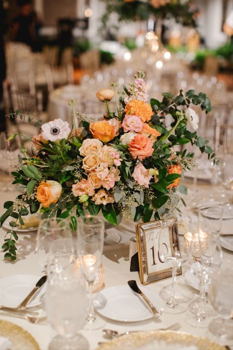 White And Orange Centerpieces, Eucalyptus And Orange Table Decor, Low Centerpieces Wedding Round Table, Cream Centerpieces, Wedding Table Flower Centerpieces, Round Table Centerpieces Wedding, Orange Wedding Centerpieces, Low Wedding Centerpieces, Round Table Centerpiece