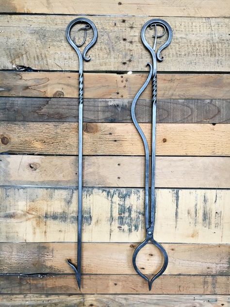 Indoor fireplace poker and log tongs by Phoenix Handcraft and Lucia Metal Studios Forge Ideas, Fire Tools, Steel Anniversary Gifts, Blacksmithing Ideas, Fire Poker, Fire Pit Tools, Black Smithing, Iron Anniversary Gifts, Fire Pokers